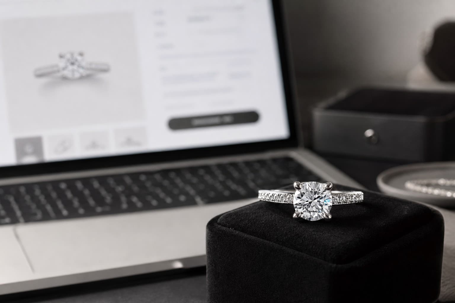 Luxury engagement ring resting on a dark premium background
